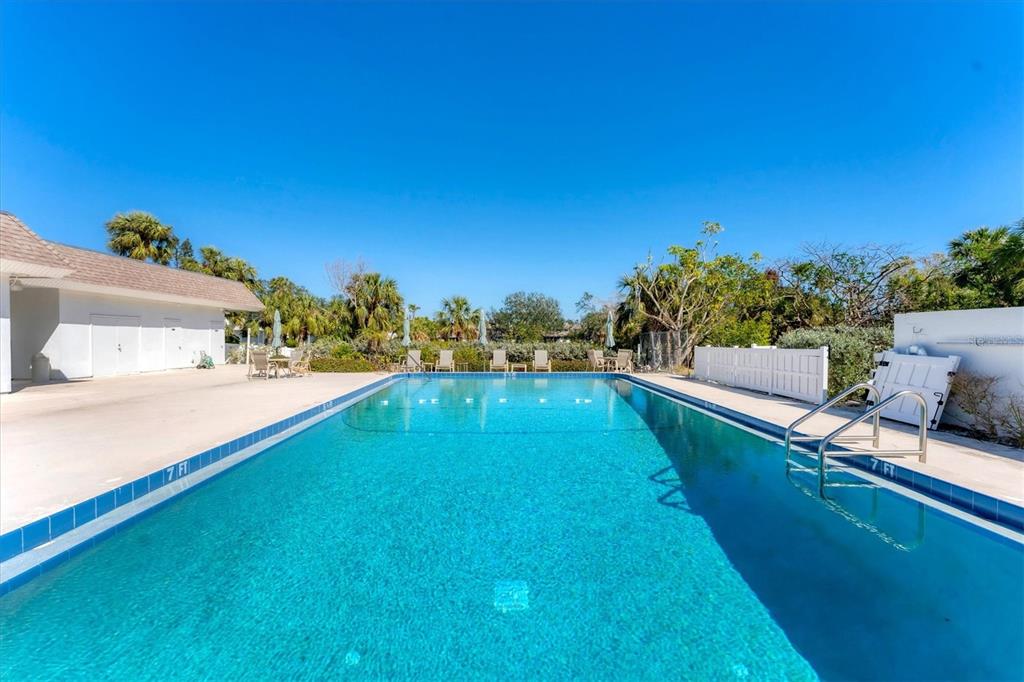 534 Sutton Place Longboat Key, FL 34228 - Photo 37 of 47 a view of a lake with a swimming pool