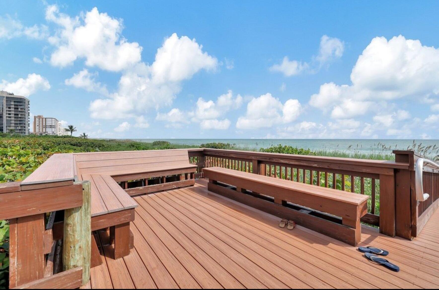 3870 North Hwy A1A, Unit 1011 Hutchinson Island, FL 34949 - Photo 20 of 30 a view of balcony with wooden floor and city view