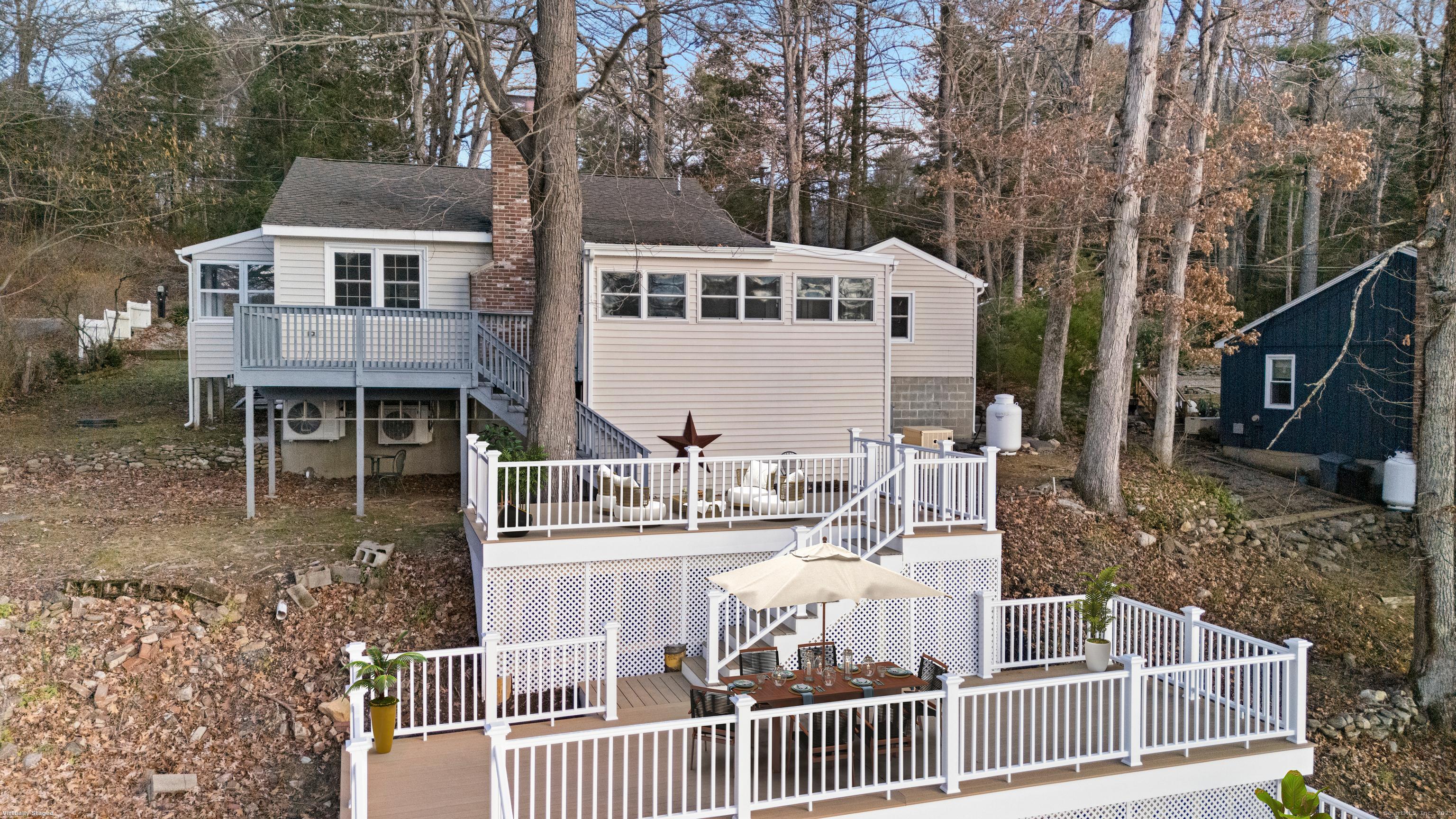 60 Indian Spring Road Woodstock, CT 06282 - Photo 2 of 32 a view of a house with backyard and deck