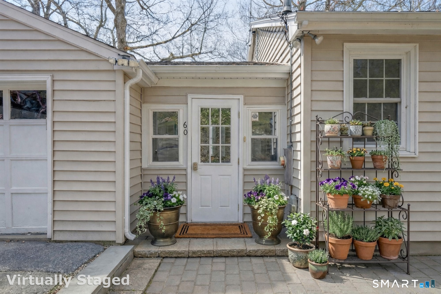 60 Indian Spring Road Woodstock, CT 06281 - Photo 35 of 40 a view of a house with potted plants