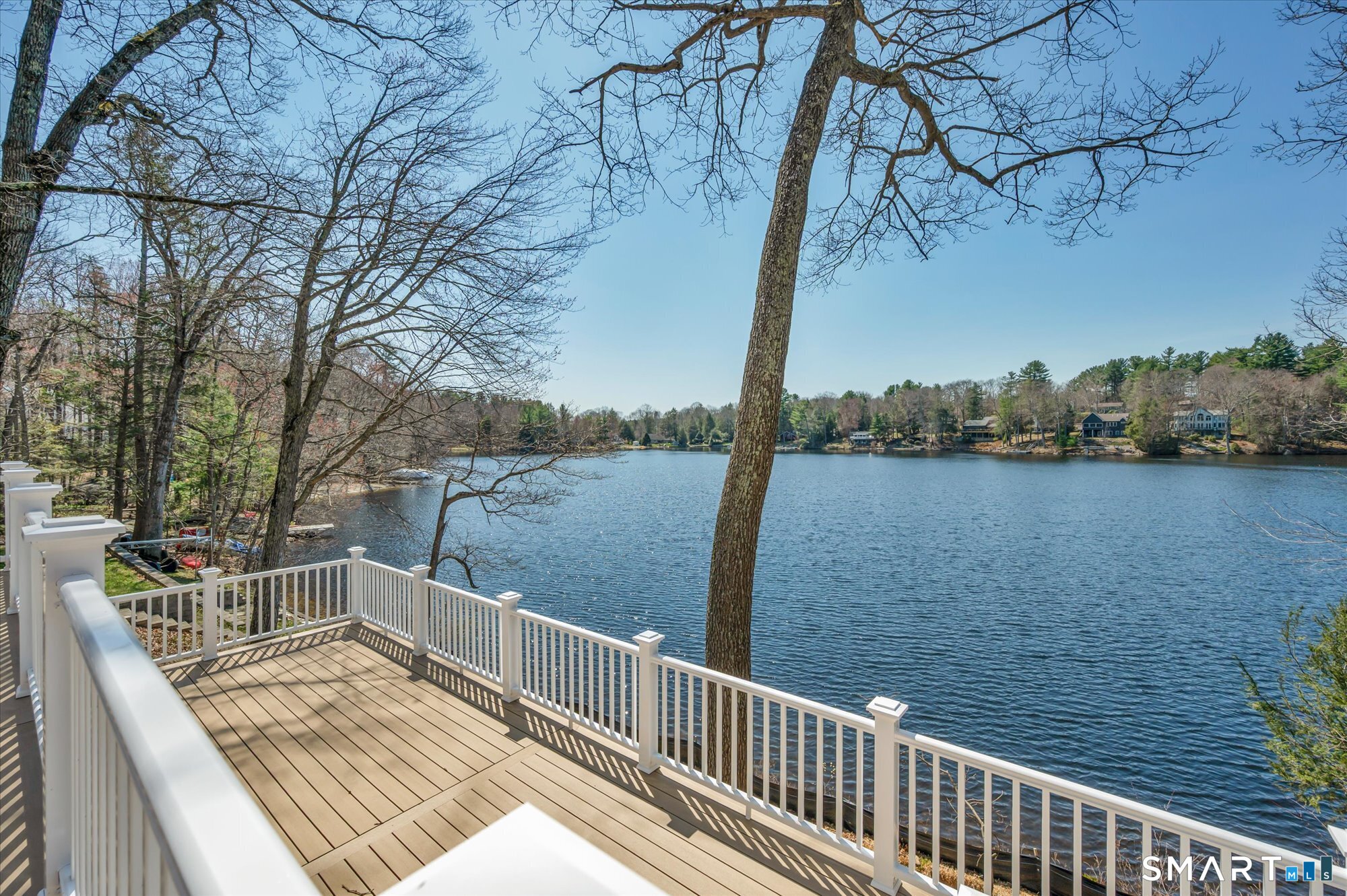 60 Indian Spring Road Woodstock, CT 06281 - Photo 36 of 40 a view of a balcony with wooden chairs and lake view