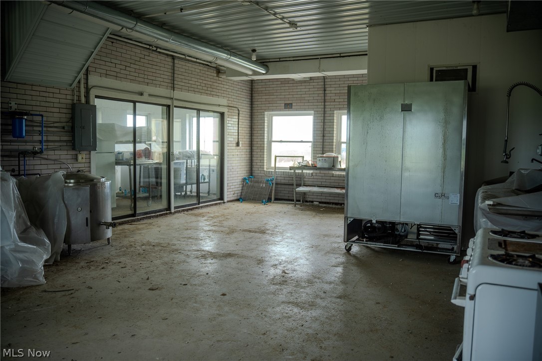 513 Ragersville Road Northwest Sugarcreek, OH 44681 - Photo 15 of 50 Misc room with electric panel and concrete floors