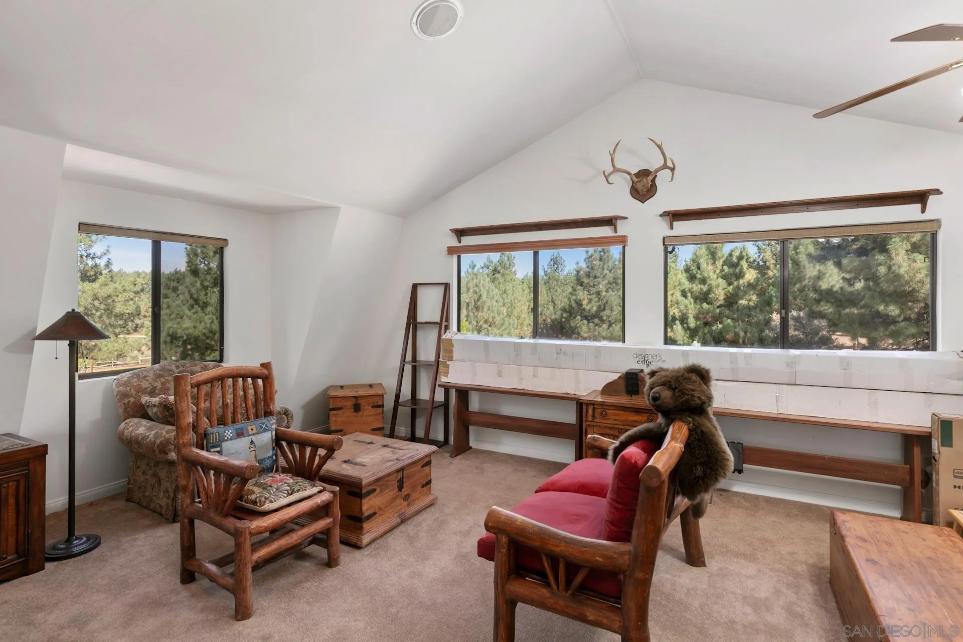 8203 Morris Ranch Road Pine Valley, CA 91962 - Photo 17 of 42 a living room with furniture and a large window
