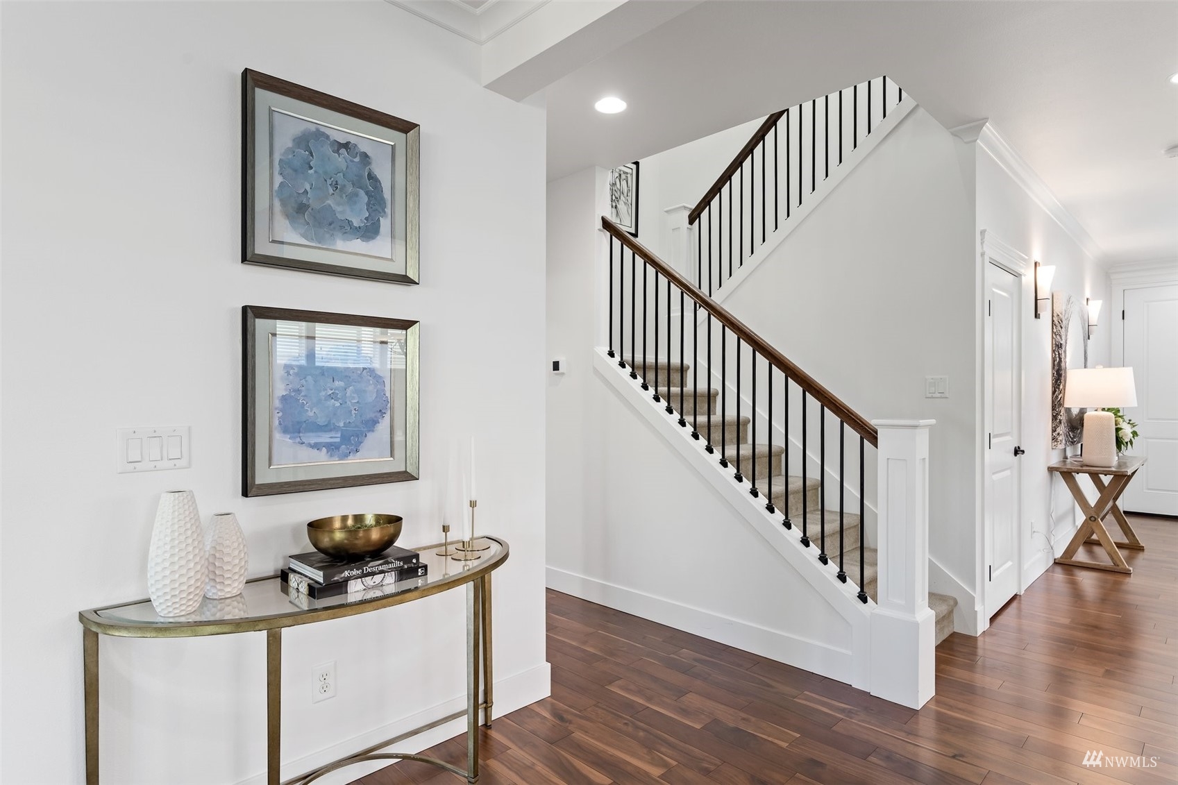 1012 North 29th Street Renton, WA 98056 - Photo 17 of 40 a workspace with wooden floor and stairs