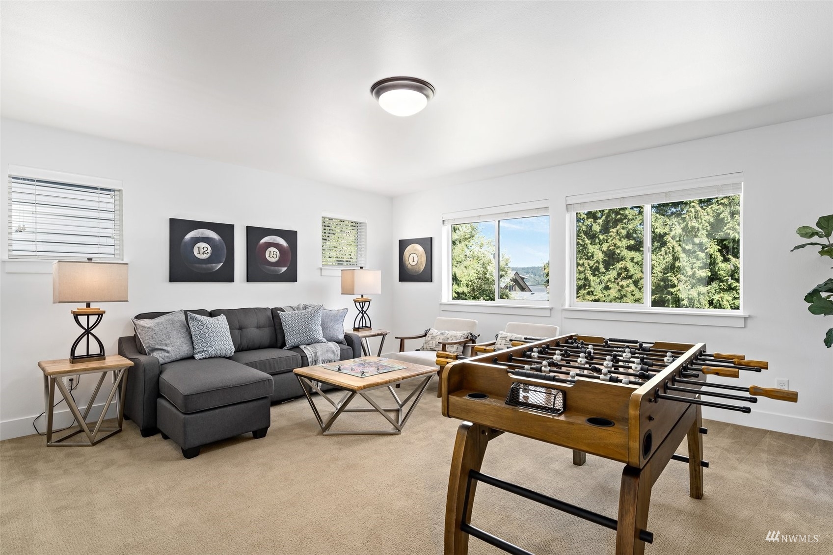 1012 North 29th Street Renton, WA 98056 - Photo 32 of 40 a living room with furniture and a window