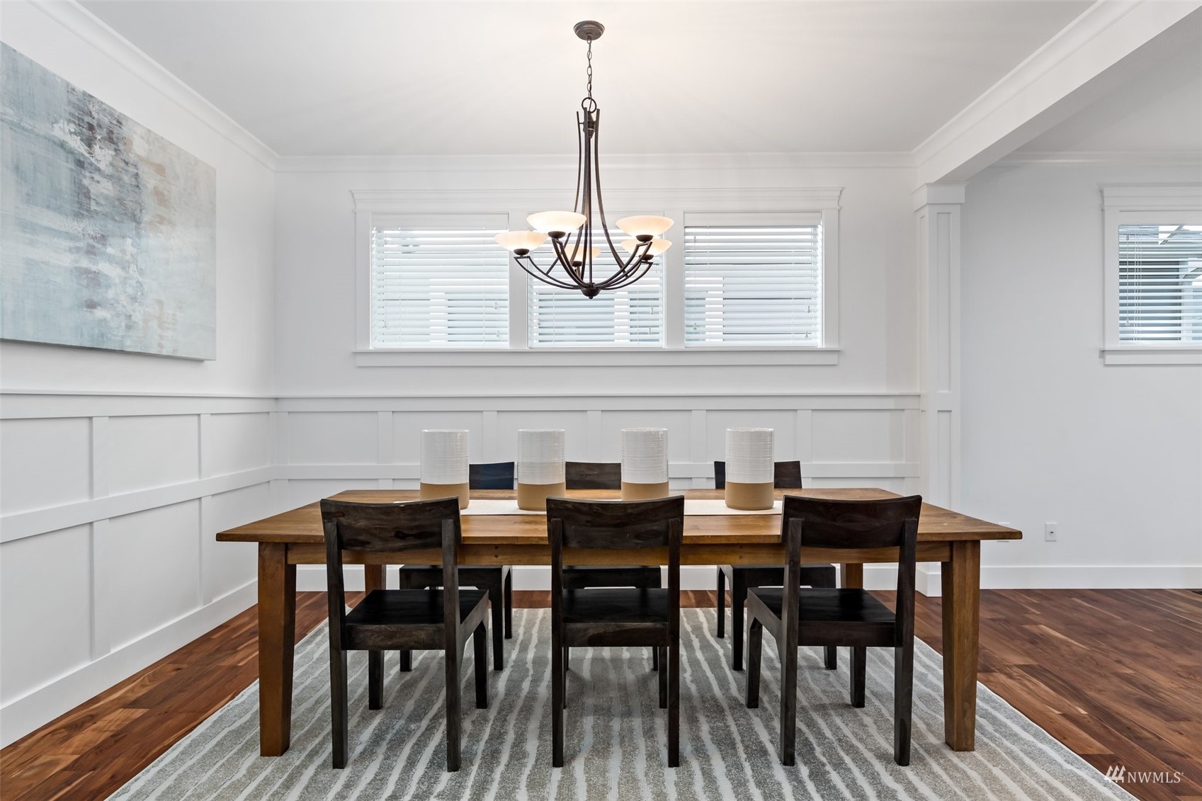 1012 North 29th Street Renton, WA 98056 - Photo 6 of 40 a view of a dining room with furniture window and wooden floor