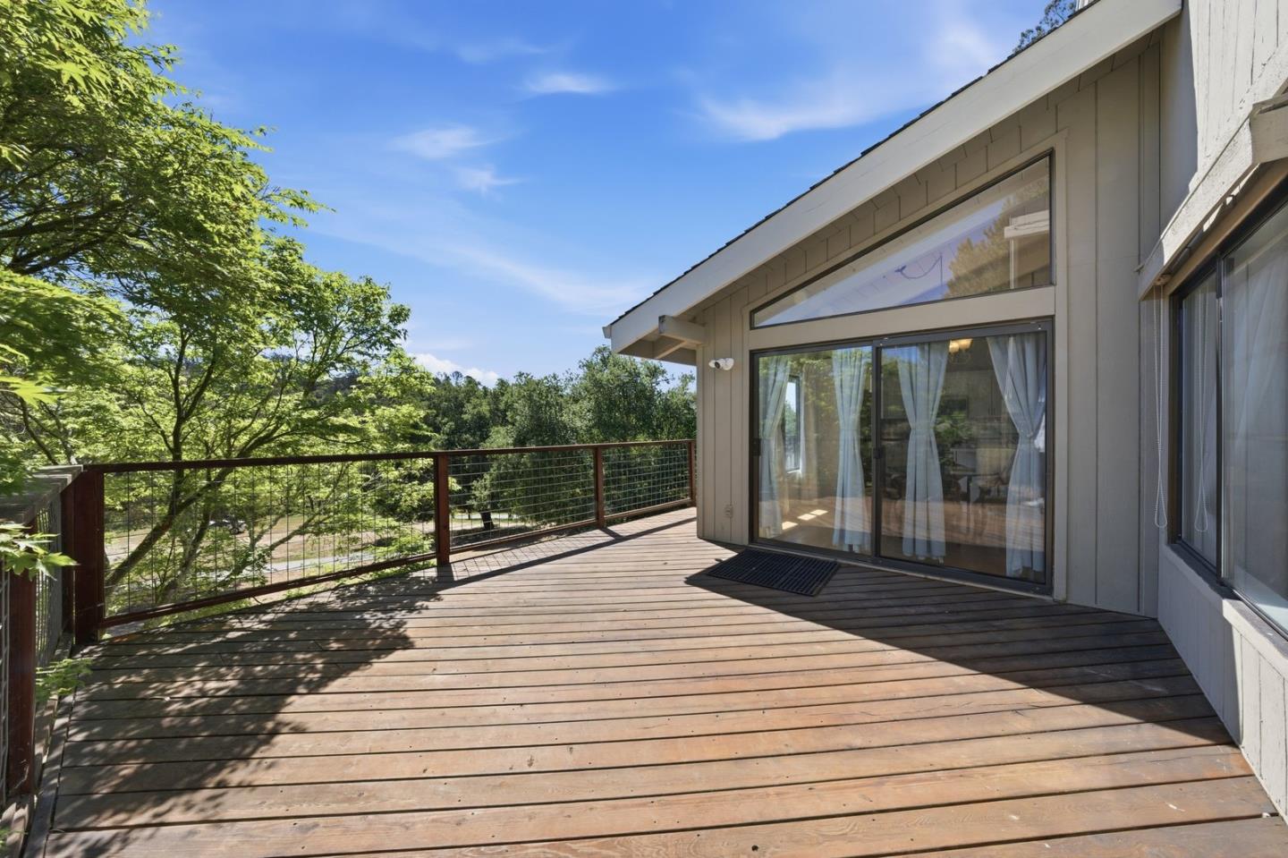 701 Day Valley Road Aptos, CA 95003 - Photo 37 of 43 a view of balcony with wooden floor and fence