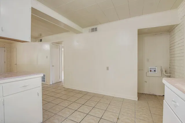 a bathroom with a sink a toilet and a shower