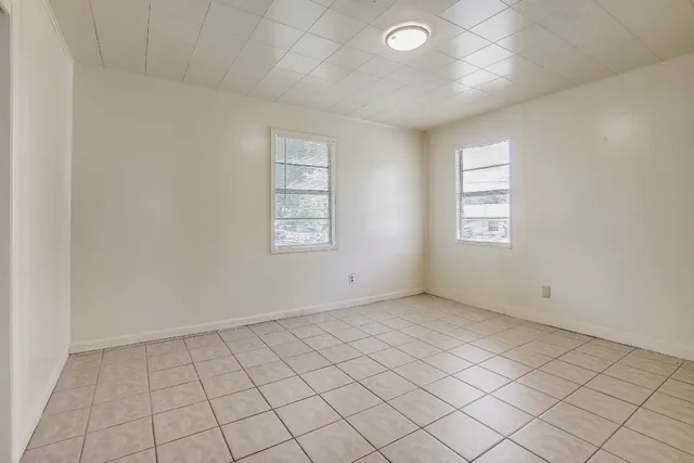 an empty room with windows