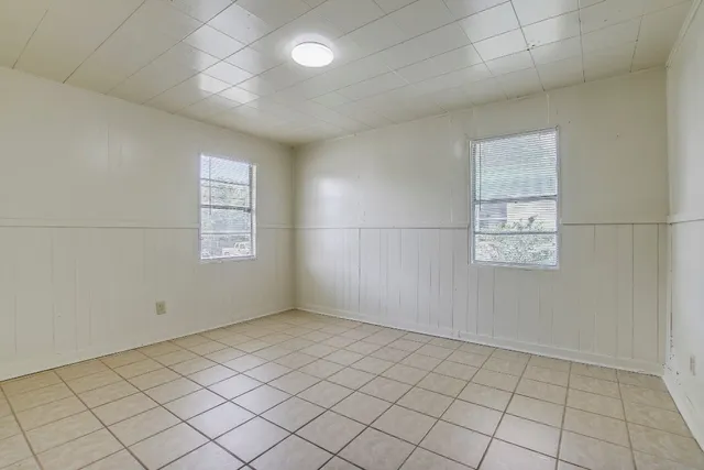 a view of an empty room and window