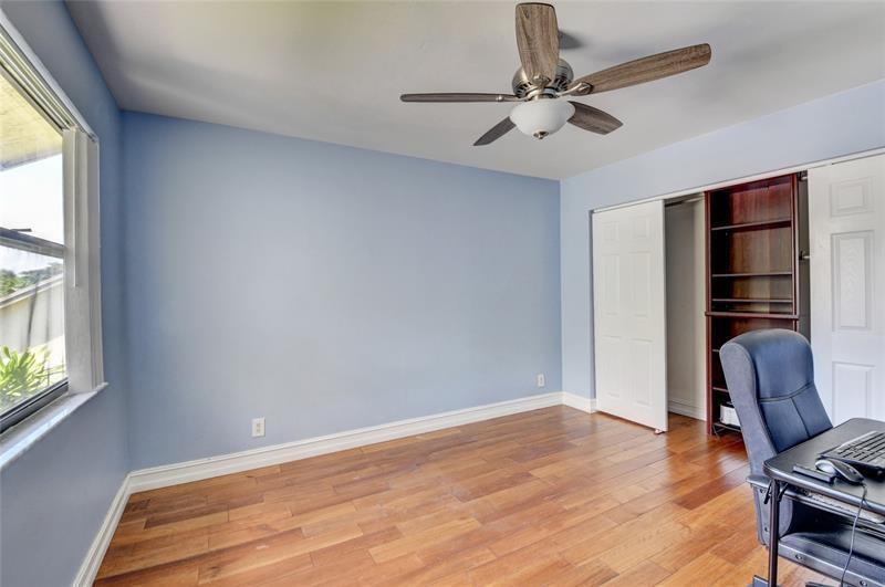 9316 Ketay Circle Boca Raton, FL 33428 - Photo 24 of 30 a view of room with window and wooden floor