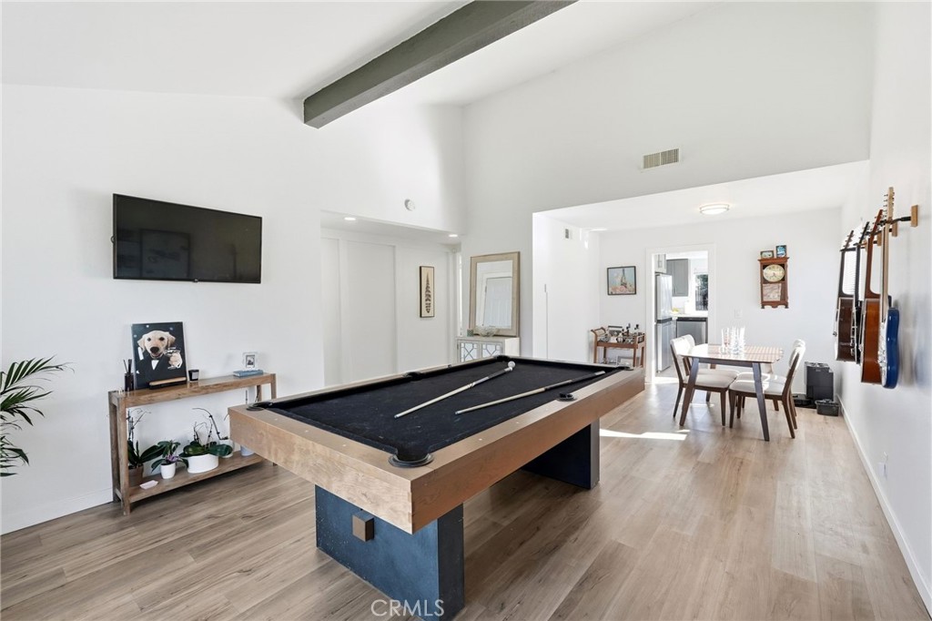 41428 50th Street West Lancaster, CA 93536 - Photo 14 of 46 a living room with furniture and a flat screen tv