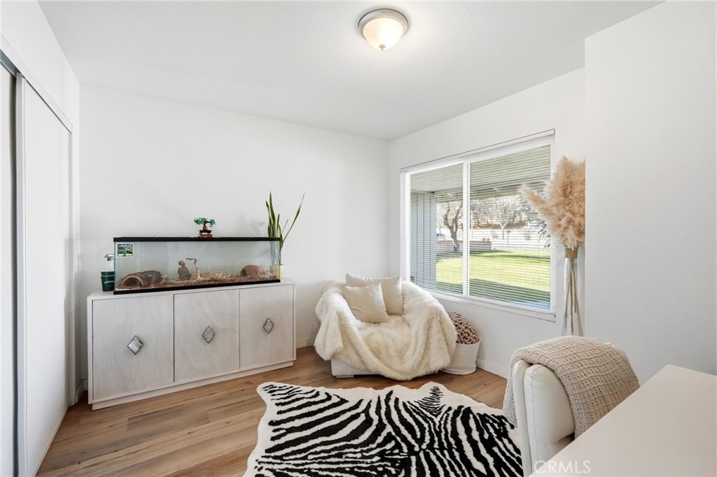 41428 50th Street West Lancaster, CA 93536 - Photo 26 of 46 a bedroom with furniture and window