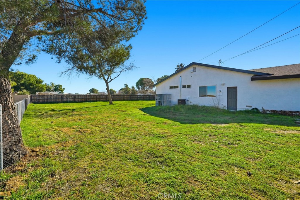 41428 50th Street West Lancaster, CA 93536 - Photo 33 of 46 a view of a house with a yard