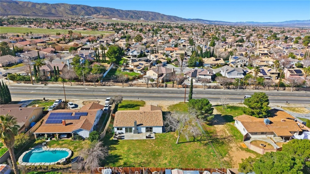 41428 50th Street West Lancaster, CA 93536 - Photo 41 of 46 an aerial view of residential houses with outdoor space