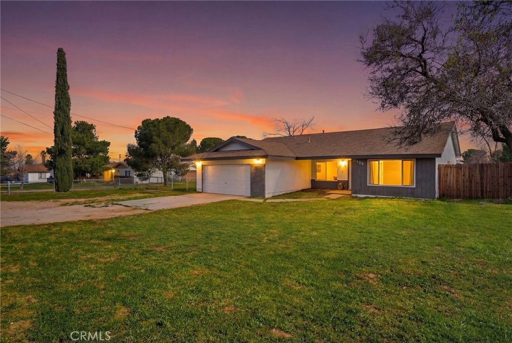 41428 50th Street West Lancaster, CA 93536 - Photo 44 of 46 a view of a house with a yard