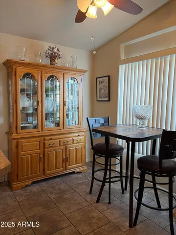 a view of a room with furniture window and wooden floor