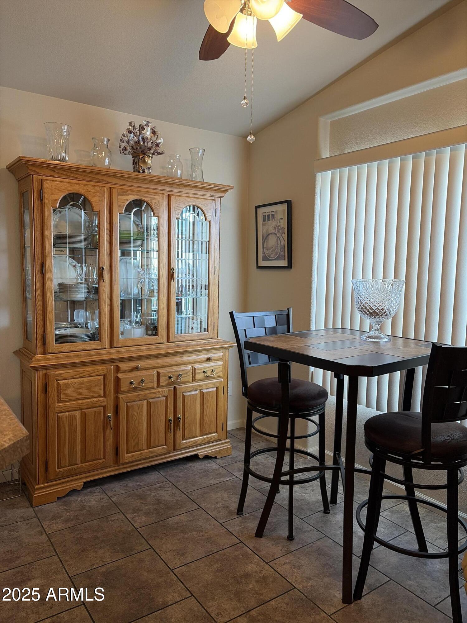 2929 East Main Street, Unit 43 Mesa, AZ 85213 - Photo 16 of 36 a view of a dining room with furniture window and outside view