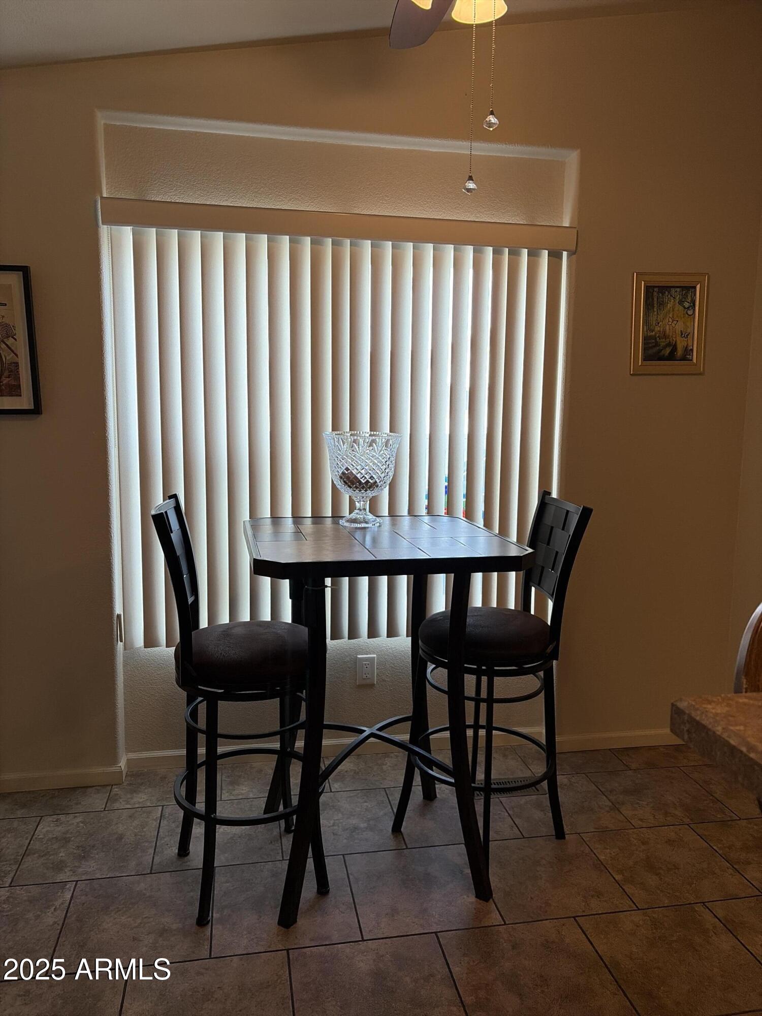 2929 East Main Street, Unit 43 Mesa, AZ 85213 - Photo 17 of 36 a view of a room with furniture window and wooden floor