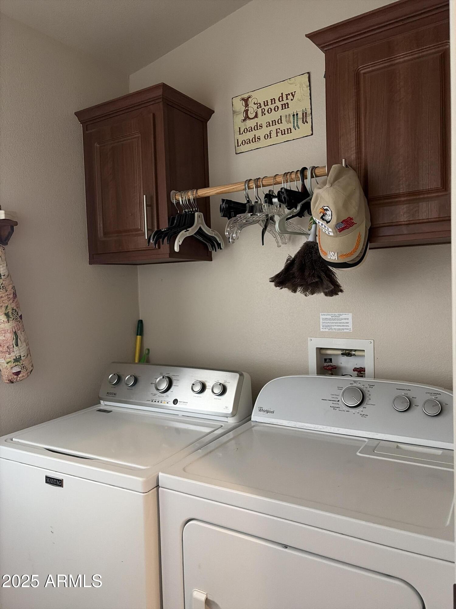 2929 East Main Street, Unit 43 Mesa, AZ 85213 - Photo 33 of 36 a utility room with dryer and washer