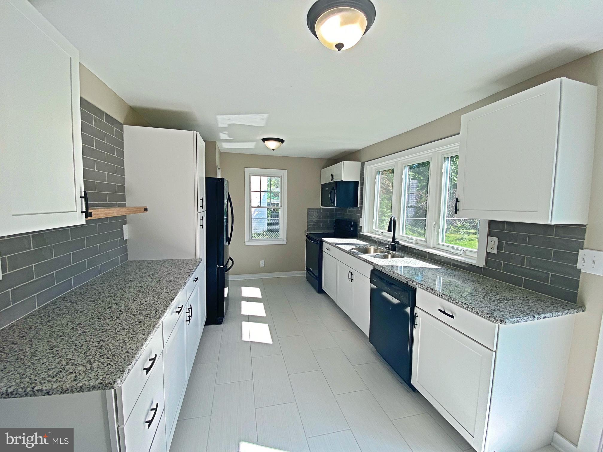 203 Caroline Avenue Ridgely, MD 21660 - Photo 18 of 30 Kitchen with Granite Counter Tops