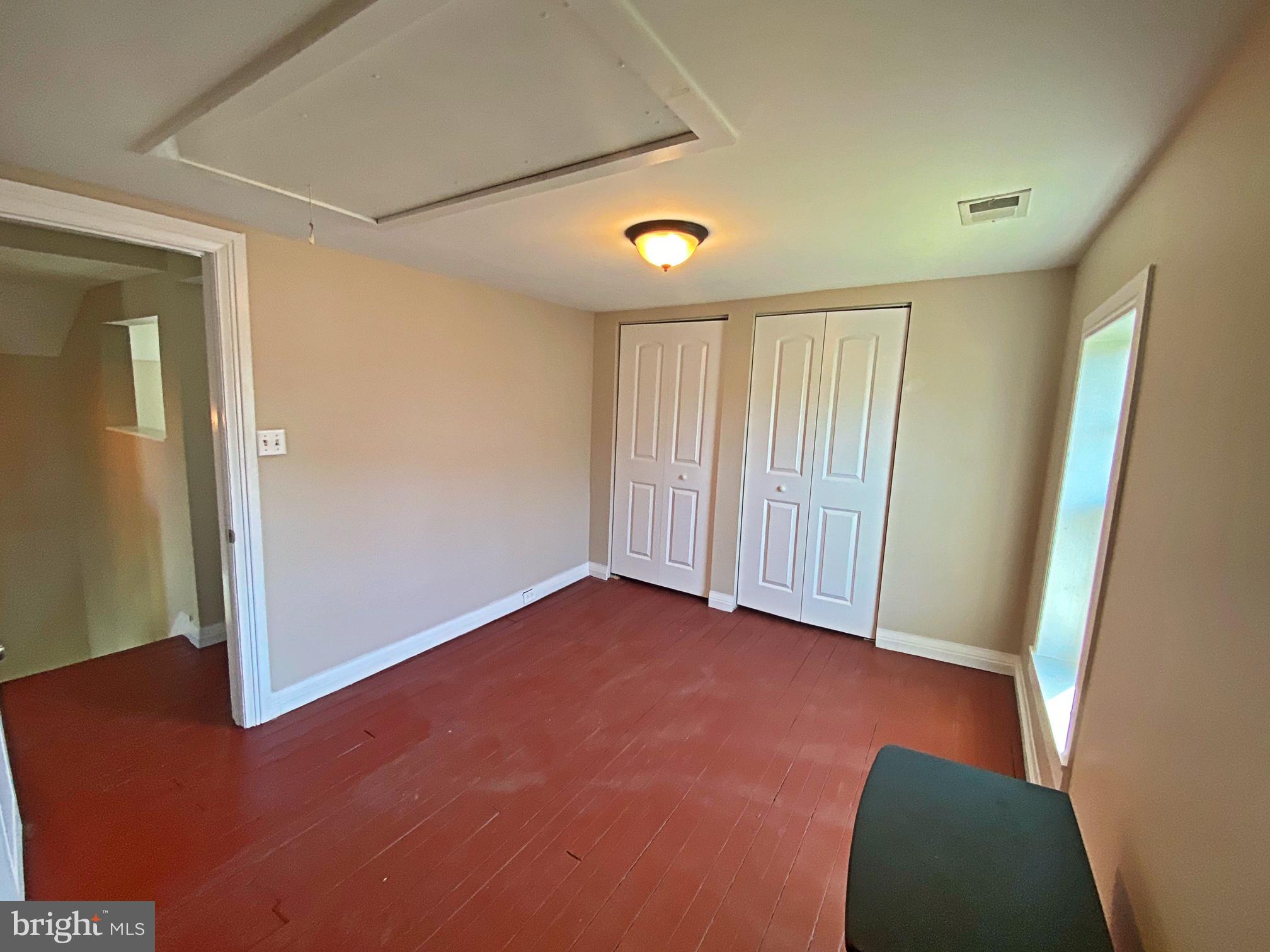 203 Caroline Avenue Ridgely, MD 21660 - Photo 23 of 30 Spacious Second Bedroom with Ceiling Light