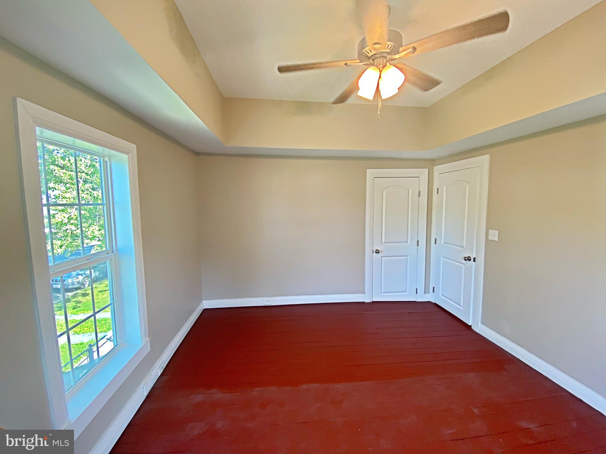 203 Caroline Avenue Ridgely, MD 21660 - Photo 26 of 30 Primary Bedroom w/ Hardwood Floors