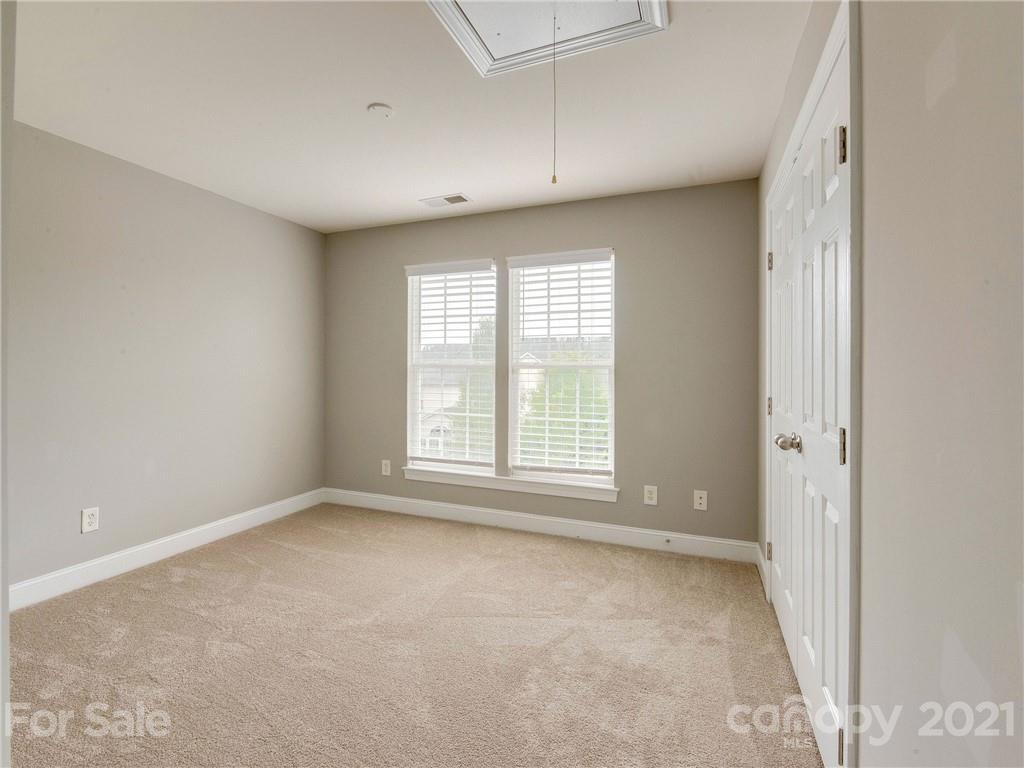 2314 Mermans Road Charlotte, NC 28270 - Photo 20 of 45 a view of an empty room with a window