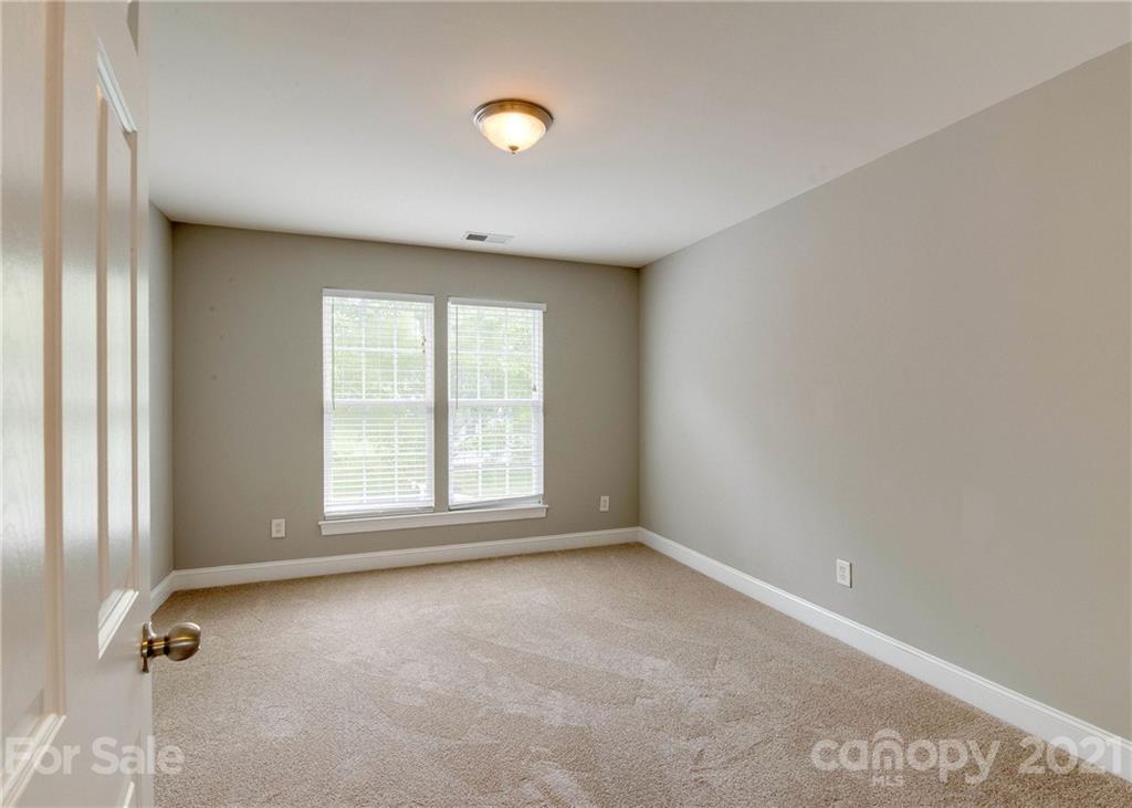 2314 Mermans Road Charlotte, NC 28270 - Photo 22 of 45 an empty room with a window