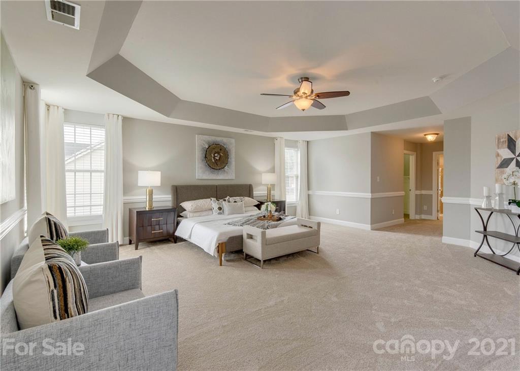 2314 Mermans Road Charlotte, NC 28270 - Photo 26 of 45 a living room with furniture and a large window