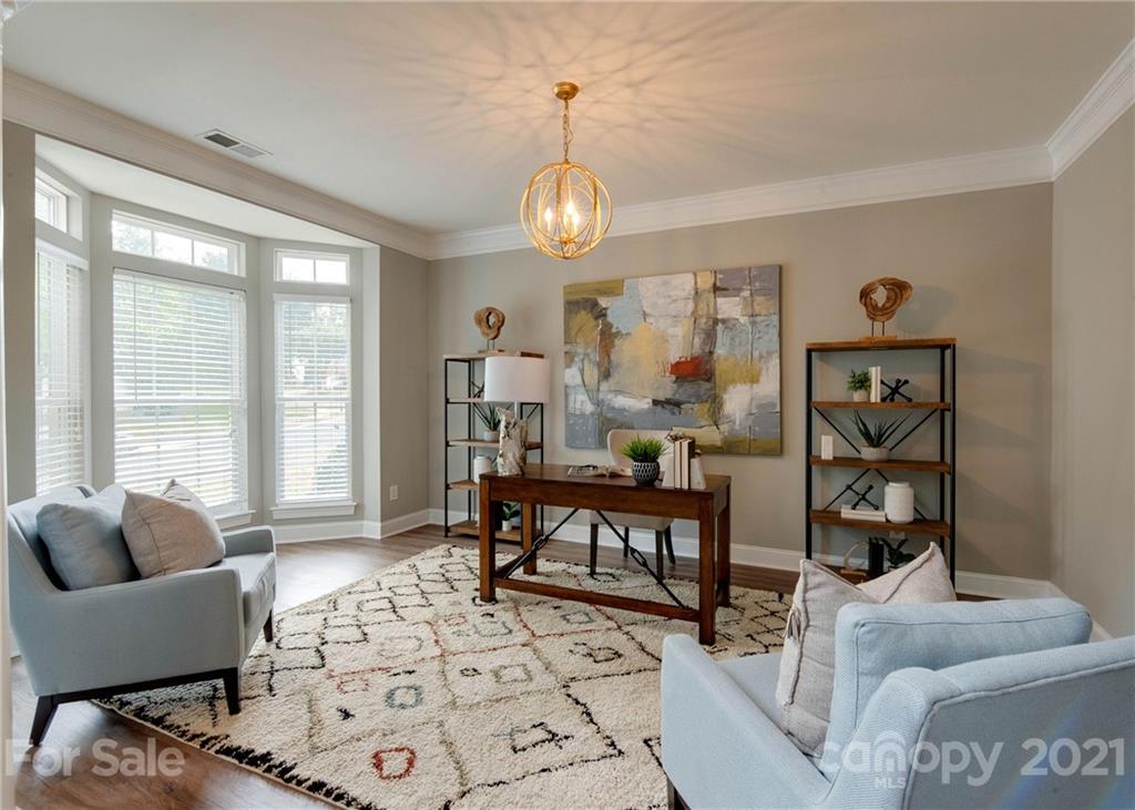 2314 Mermans Road Charlotte, NC 28270 - Photo 4 of 45 a view of a livingroom with furniture and window