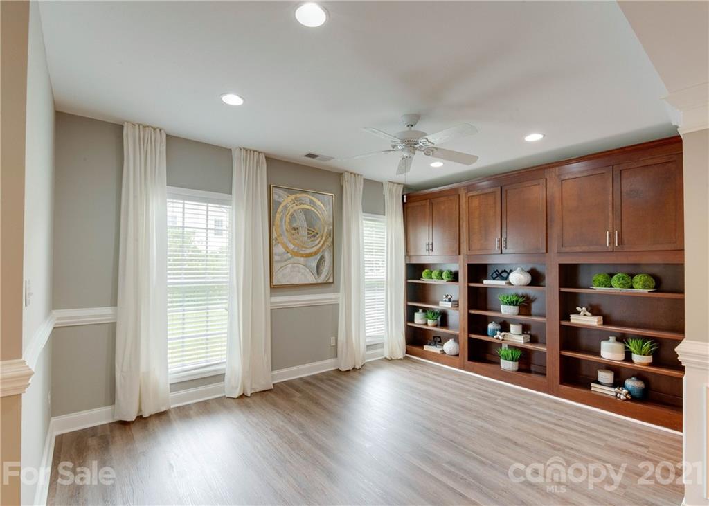 2314 Mermans Road Charlotte, NC 28270 - Photo 38 of 45 a view of empty room with wooden floor and shoes