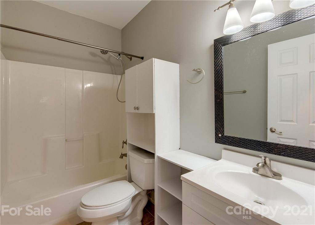 2314 Mermans Road Charlotte, NC 28270 - Photo 41 of 45 a bathroom with a sink toilet and shower