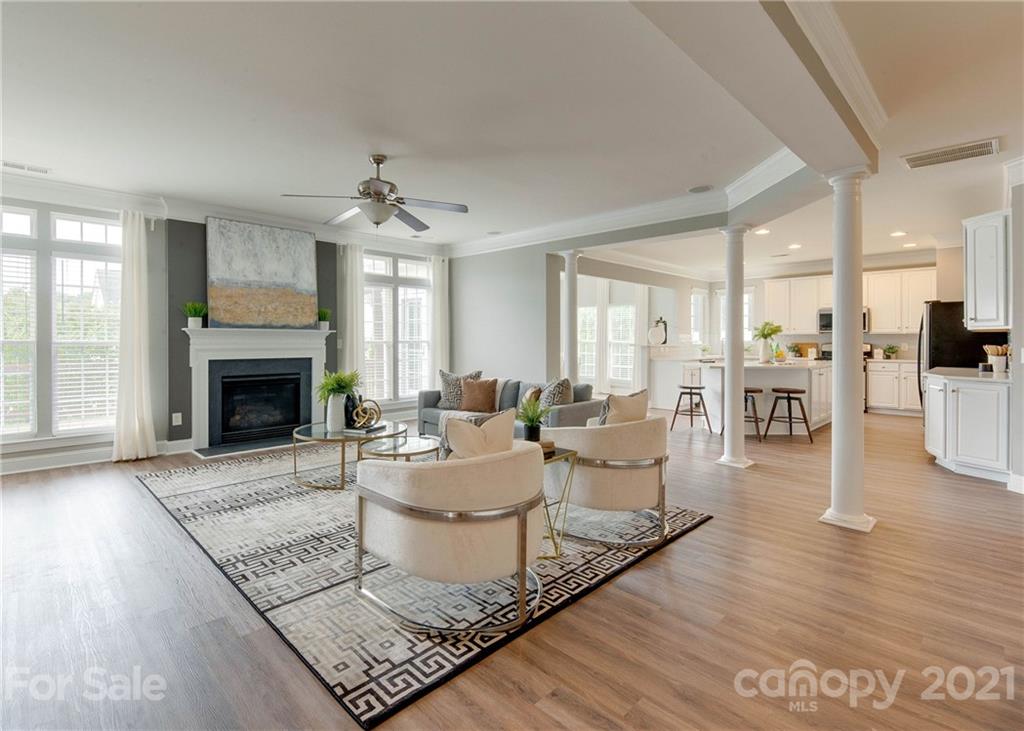 2314 Mermans Road Charlotte, NC 28270 - Photo 7 of 45 a living room with furniture and a fireplace