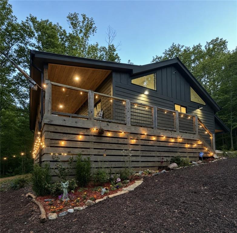 191 Oakwood Road Blairsville, GA 30512 - Photo 1 of 43 a view of outdoor space and deck