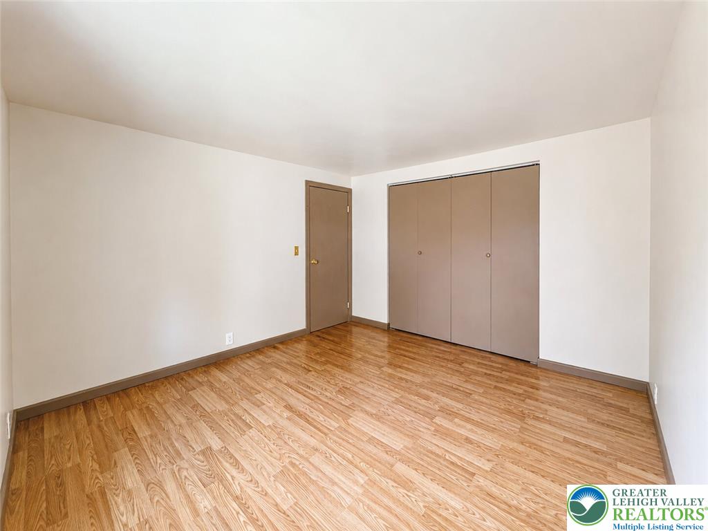 4995 Mountain Road Slatington, PA 18080 - Photo 20 of 30 A room offering ample storage with closet space and durable wood flooring.