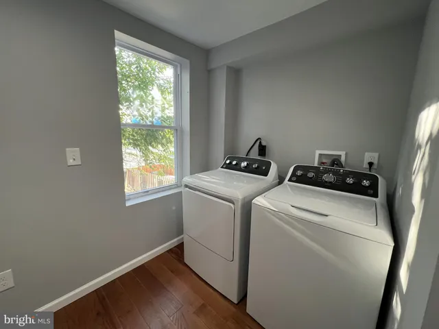 a utility room with dryer and washer