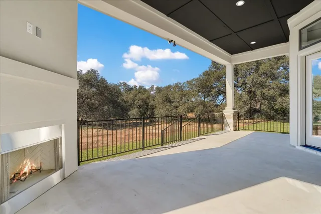 a view of a room with porch and wooden floor