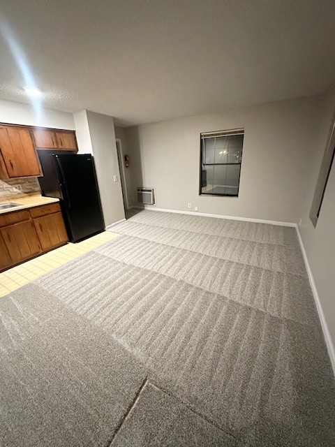 101 East Gray Street, Unit 3 Gallatin, TN 37066 - Photo 1 of 9 a bedroom with a bed and a view of kitchen