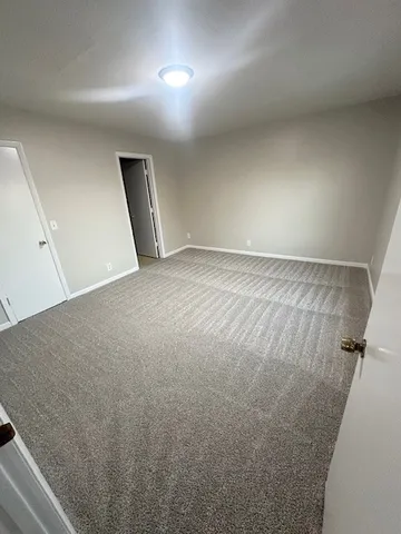 an empty room with a workbench