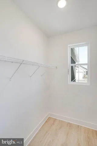 a view of a room that has a window