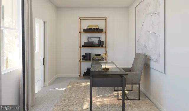 a workspace with furniture and window