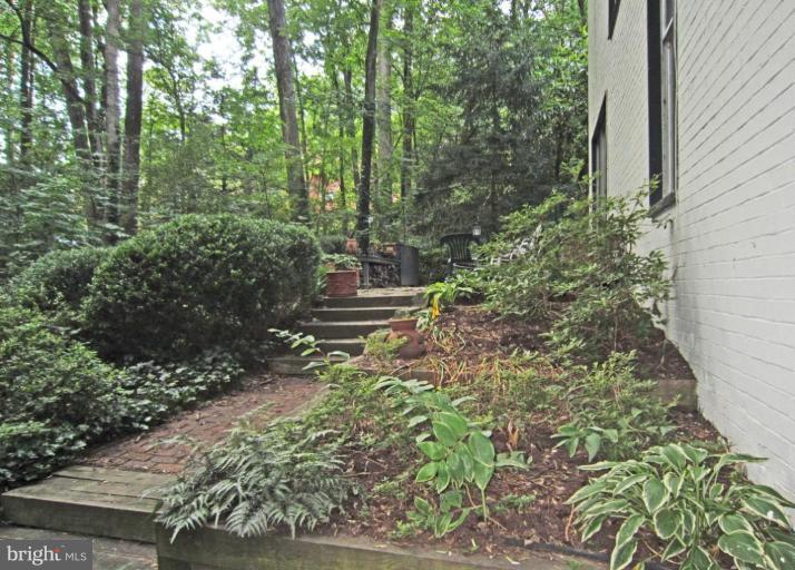 11499 Waterview Cluster Reston, VA 20190 - Photo 24 of 26 Side Garden with Brick Steps and Patio
