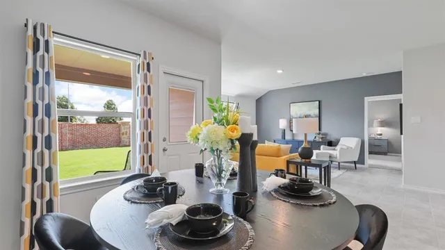 a view of a dining room with furniture