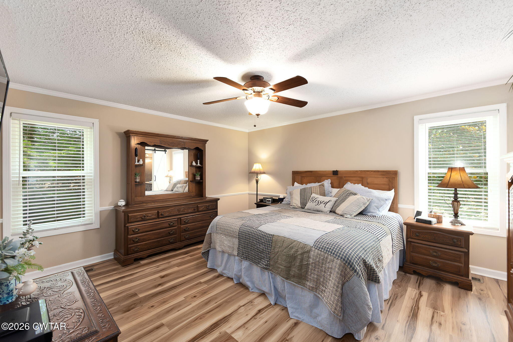 328 New Hope Road Ripley, TN 38063 - Photo 15 of 39 a bedroom with a bed and windows