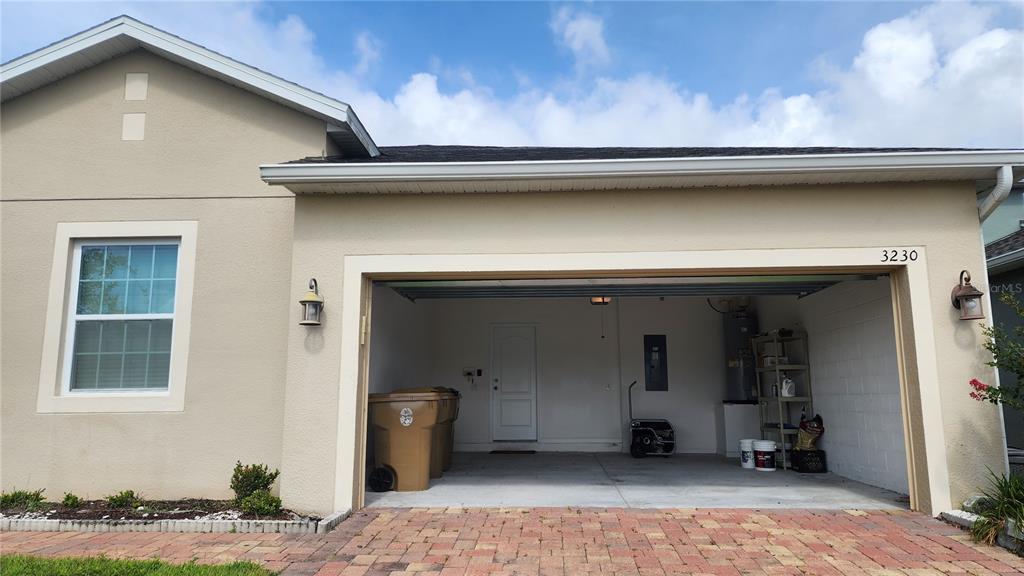 3230 Stratton Circle Kissimmee, FL 34744 - Photo 27 of 28 a view of a car in front of a house