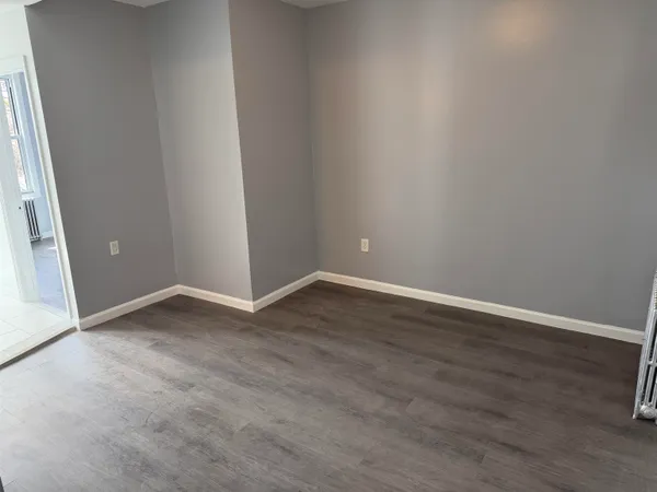 a bathroom with a toilet a sink and shower