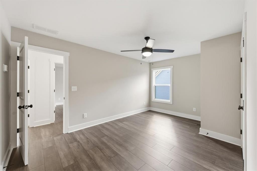 139 Old Alabama Road Southeast Emerson, GA 30137 - Photo 35 of 50 a view of a room with wooden floor and white walls
