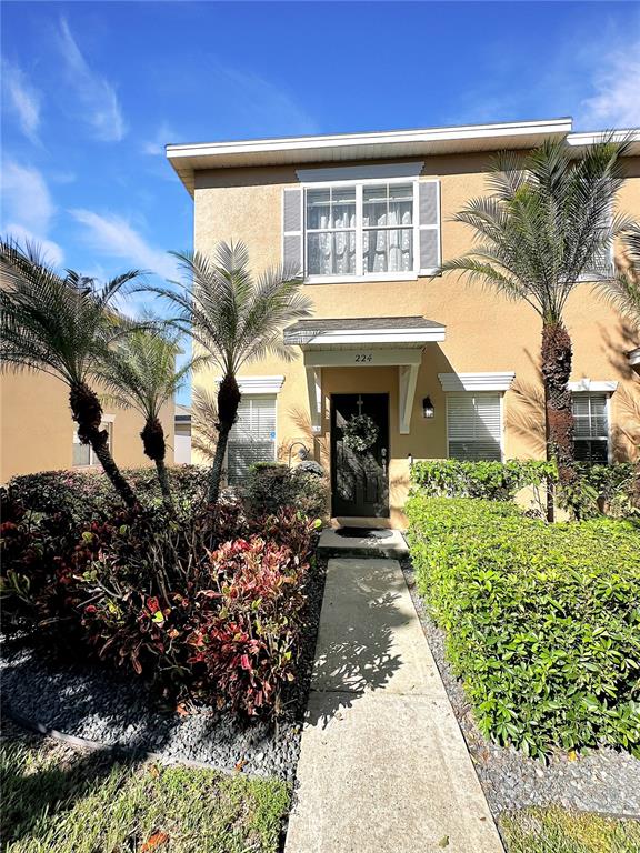 224 Deepcove Road Winter Garden, FL 34787 - Photo 1 of 1 a front view of a house with a yard