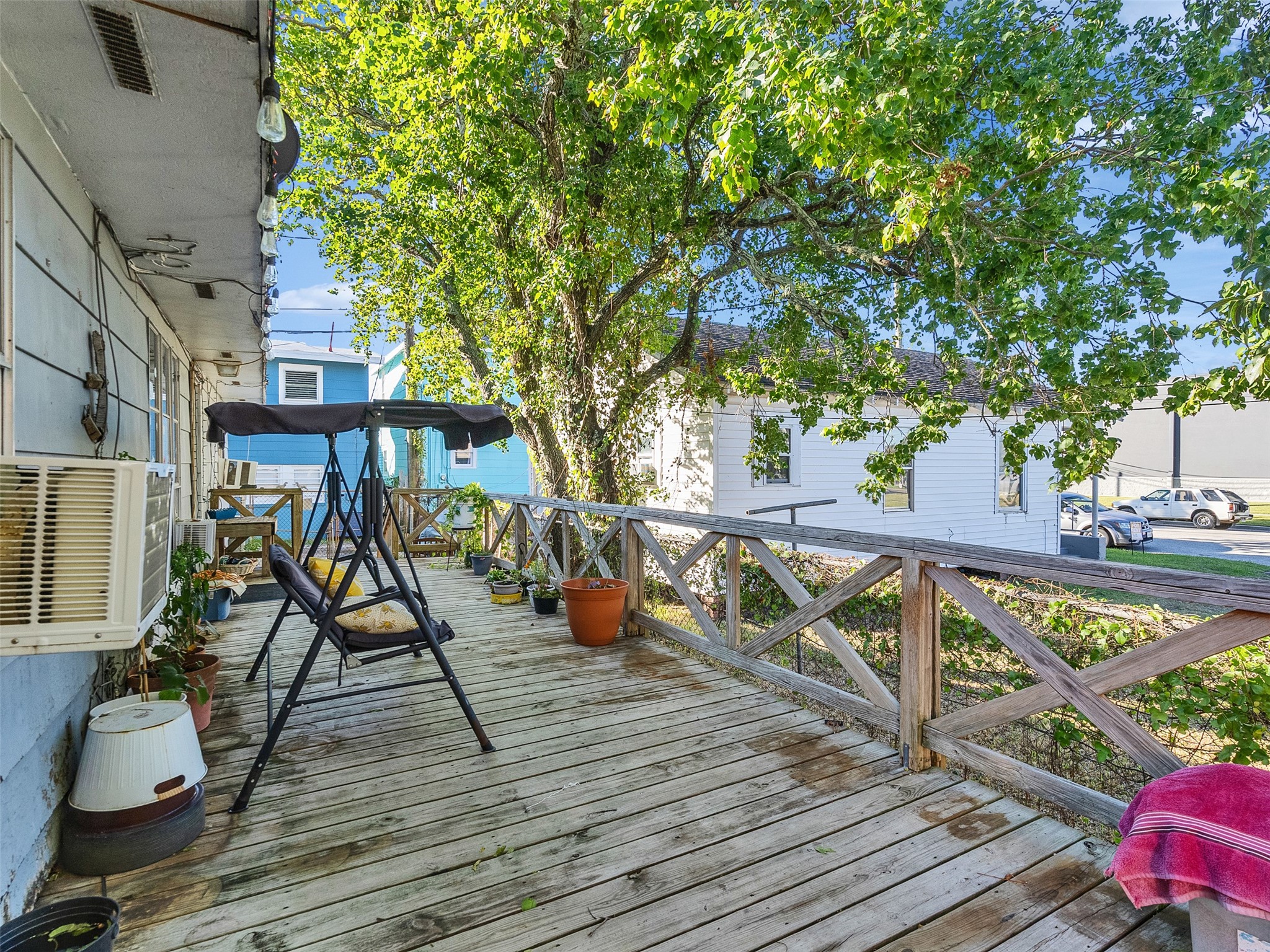 4323 Avenue R 1/2 Galveston, TX 77550 - Photo 24 of 41 Deck/Patio/Porch (Front Unit):
The elevated deck is perfect for outdoor dining or relaxing in the fresh air. It’s a great extension of your living space for island evenings.